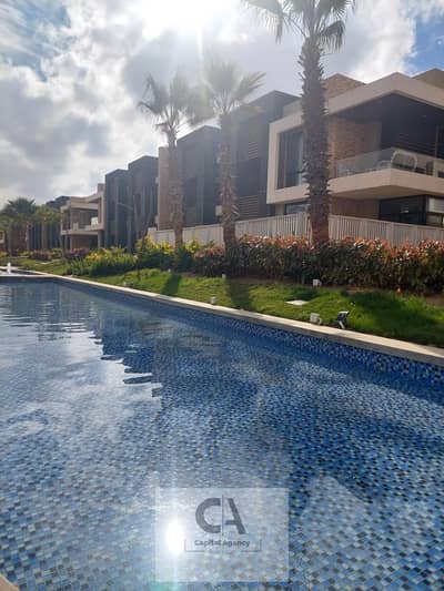 Villa for sale in the Fifth Settlement in front of the American University - Midtown Compound at cash price with a distinctive view | Or pay a 10% dow
