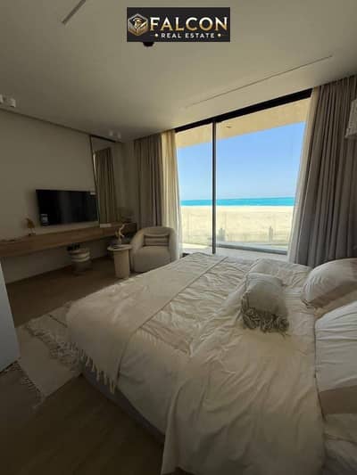 On the sea with a clear view from all directions, a dreamy first-row chalet in Marina El Alamein, North Coast, next to Marassi and Mazarine.