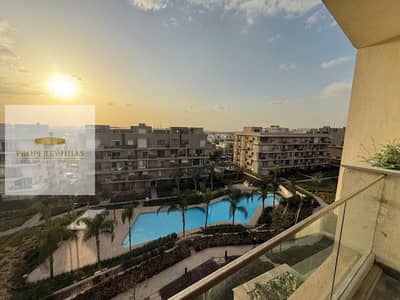 شقة علي لاجون متشطبة بالكامل للبيع في بالم هيلز التجمع palm hills new cairo