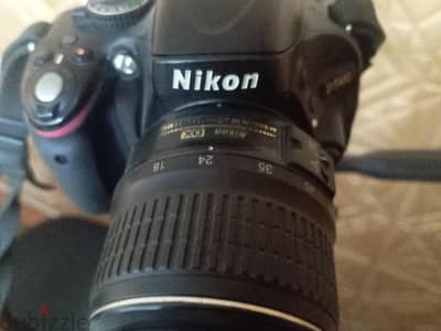 Nikon D5100 ومعاها عدسة Nikon AF-S DX 18-55mm VR