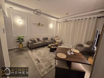 Furnished 100-square-meter, two-bedroom apartment for rent in Privado, Madinaty; features a lake view and is located near the banking complex and scho