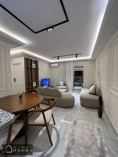 Furnished 84-square-meter, two-bedroom apartment for rent in Madinaty (B7), featuring a private garden and natural gas supply for the kitchen and bath