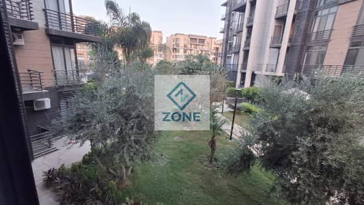 Apartment for rent in Madinaty, 127 sq m, garden view, super deluxe finishing, includes 2 air conditioners, roller shutters, parquet flooring in the r