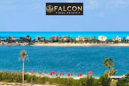 شاليه فندقي  100 %SEA VIEW من جميع الاتجاهات خطوات للبحر في مارينا قلب العلمين الجديدة