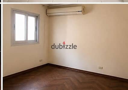 Apartment for rent in Dokki, Q. J. with kitchen, air conditioning, and appliances