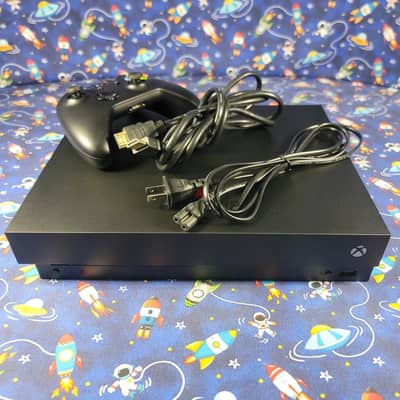 xbox one x مستعمل حالة جيدة جدا