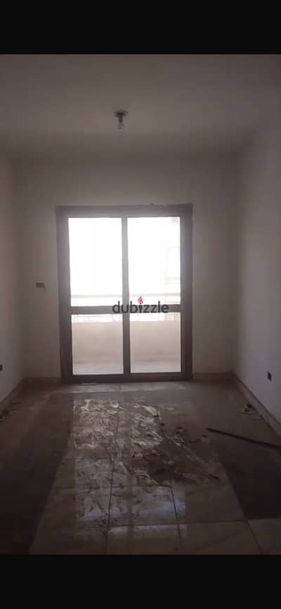 شقة ب ٨٠٠ فدان اكتوبر الجديدة - ٢ نمرة من شارع الكوبري قطاع أ دور ٢