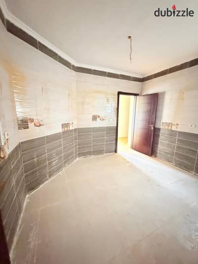 Ground floor apartment for sale, ready to move  170 square meters, 3 bedrooms + 3 bathrooms, prime location with an open view, Wasal Compound, S