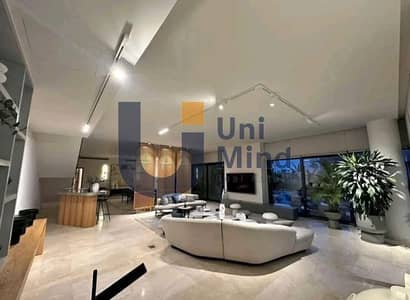 Villa for sale delivery 2 years, with a landscape view large garden in patio next to Katameya Dunes.