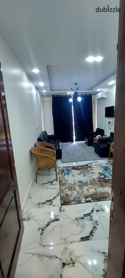 Chalet for sale 88m furnished and equipped with air conditioning in the North Coast Porto Golf Marina in front of El Alamein