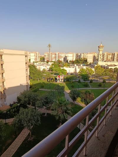 A 103m apartment for rent in Madinaty, finished by a company, in a distinguished location next to services, B6 with a garden view.