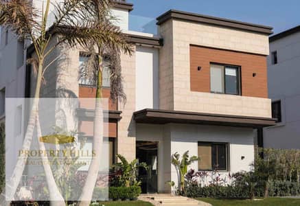 اخر فيلا من ازار كاش(12,540,000)فقط مساحه واسعه 249متر ٥ غرففي التجمع جنب الجامعه الامريكيه فيلات فقط فيو landscape