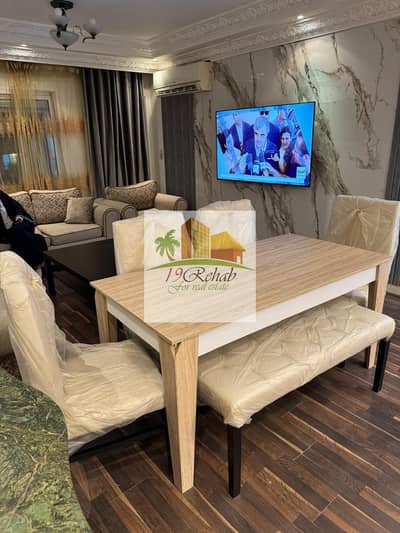 For rent in Al-Rehab 2, fully furnished hotel apartment, 3 rooms and 2 bathrooms, American kitchen, fully air-conditioned, landline Internet,