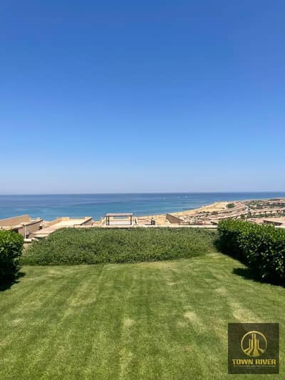 Direct sea view in Telal—the best resort in Ain Sokhna—featuring a full range of amenities such as swimming pools, restaurants, cafés, and an aqua. . .
