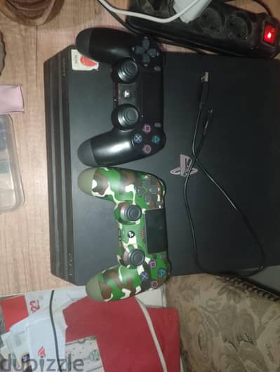 ps4 pro with 2 controllers one original and one high copy