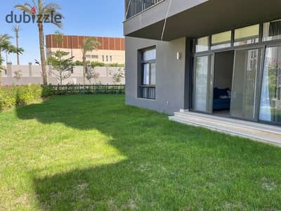 Ground-floor apartment with a garden for sale fully finished and furnished in the CFC Compound, Fifth Settlement.