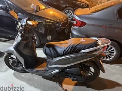 Sym st   200   اسكوتر