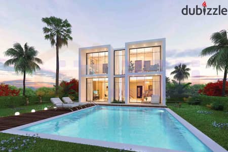 Chalet for sale, 60 sq m, New Alamein - Porto Golf (Monthly installment 40,000 EGP - Open sea view overlooking the swimming pool and Alamein Towers) -