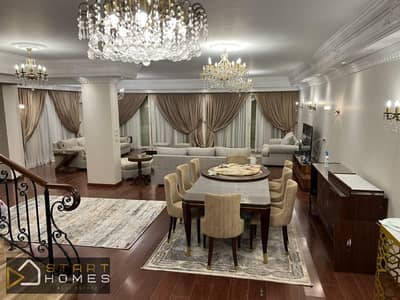 For those who appreciate luxury and sophistication: a furnished villa with a private swimming pool for rent in Al Rehab Hills