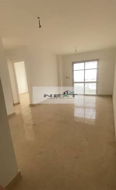 For rent in Madinaty, a new law apartment, 78 sq m, 2 bedrooms + 1 bathroom, company finishing, 4th floor, open view, very close to services and the m