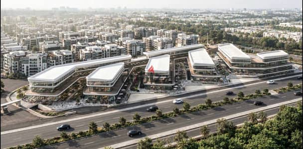 Shop For sale  محل تجاري 40+16 خارجي متر مباشرة علي البلازا  في اكبر مول تجاري في حدايق اكتوبر October Gardens بمقدم 10 % وقسط علي 7 سنين