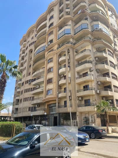 Luxury apartment for rent in a very upscale tower on Energy Street, near Al Ahly Club in Nasr City.
