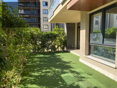 شقة بجاردن للايجار بالمطبخ والتكييفات جاهزة على السكن والمعاينة فى كمبوند ازاد بجوار الجامع الامريكية فى التجمع الخامس