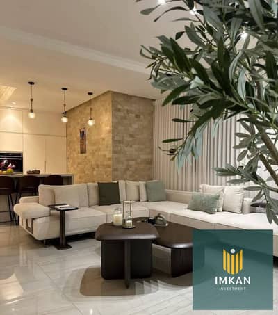 Ready for immediate handover: 4-bedroom apartment for sale in Al Shorouk, available via installment plan. Features views of the landscape and swimming