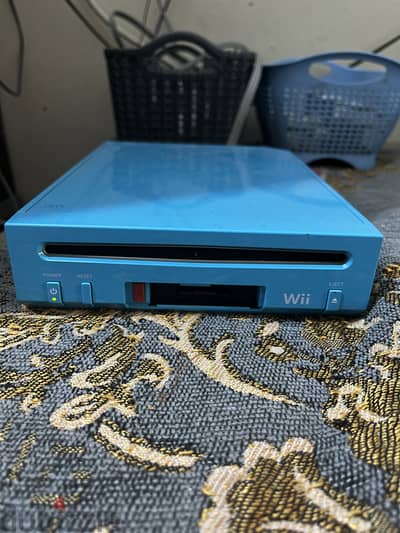 جهاز نينتيندو Wii  حاله ممتاز معدل عليه  25 لعبه مع ميموري 32