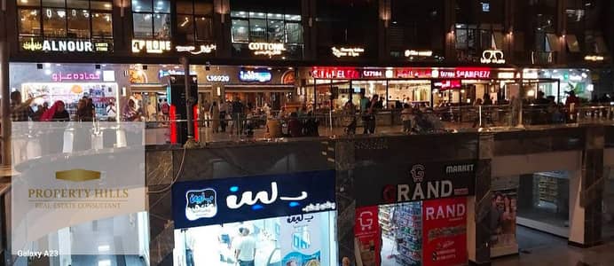 Shop for sale, rent 120,000 EGP per month, ground floor in an operating mall