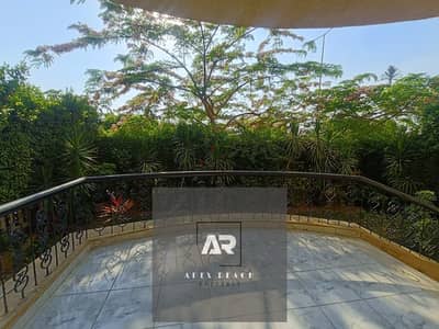 200 square meter ground floor apartment with a garden for rent in Al Rehab 2