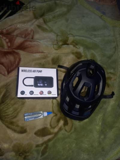 خوذه rockrider +  منفاخ عجل كهربائي + قفل
