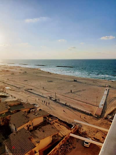 Luxury rooftop apartment for sale directly on the beach in Al-Ajami, Palm Beach, with a finishing touch, and the price will be reduced.