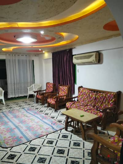 Furnished apartment with air conditioning available for daily summer rental for families and companies, 2 bedrooms, two-piece reception, kitchen, bathroom, second floor, upper in Alexandria, Al-Ajami, kilo 21, near the beach with a very distinguished location.