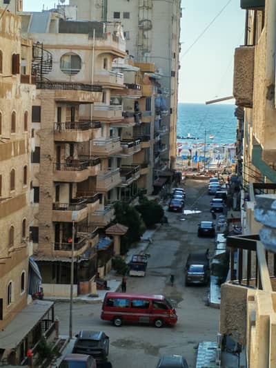 Apartment for sale at kilometer 21, Al Nakheel Beach, next to the sea and markets, a wonderful residential and holiday location, fully equipped and registered.