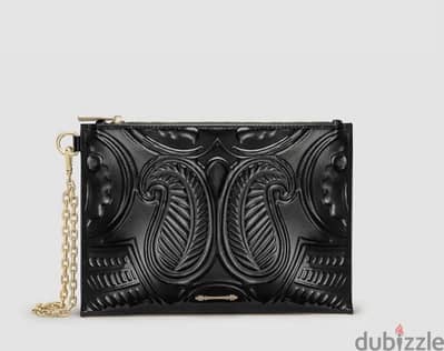 Okhtien clutch , from the store perfect condition as new