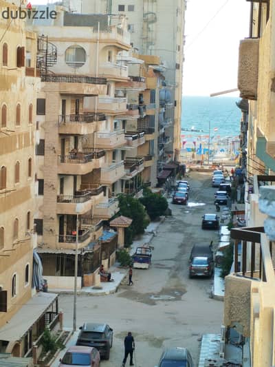 Apartment for sale next to the sea in Al-Ajami, Palm Beach, a minute from the beach, ultra-luxury finishing.