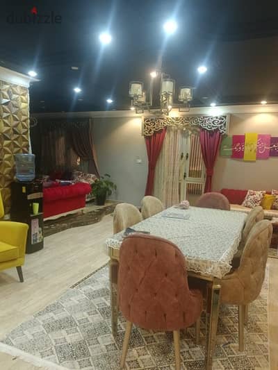 An apartment in Al-Abour City in the ninth neighborhood with a large garden view, fully finished, super lux next to public services, amenities, and transportation