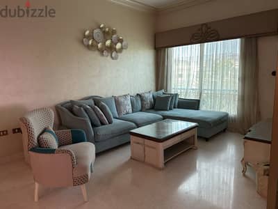 غرفة معيشة حرف L و كرسي  Modern Living Room