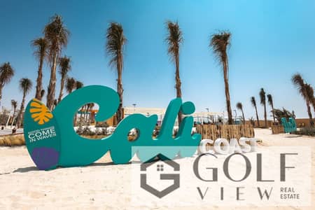 Photos of a two-bedroom chalet in Cali Coast, Ras Al-Hikma—prime location, direct lagoon view, low total contract price, and exceptional views