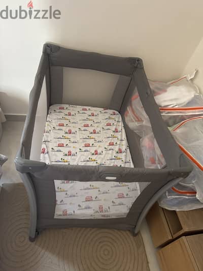 Almost New Baby Crib with it’s own Diaper changing piece and Mattress