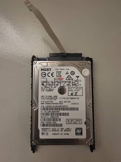هارد لابتوب HGST 1TB 7200RPM سريع كامل بالفلاتة والـ Caddy الأصلي لـ H