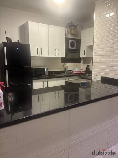 Furnished, air-conditioned hotel-style apartment next to City Stars, available for daily and monthly rent for families. Excellent location in Nasr Cit