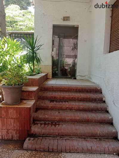 Private entrance ground for sale branching from the main Al-Said club street inDokki