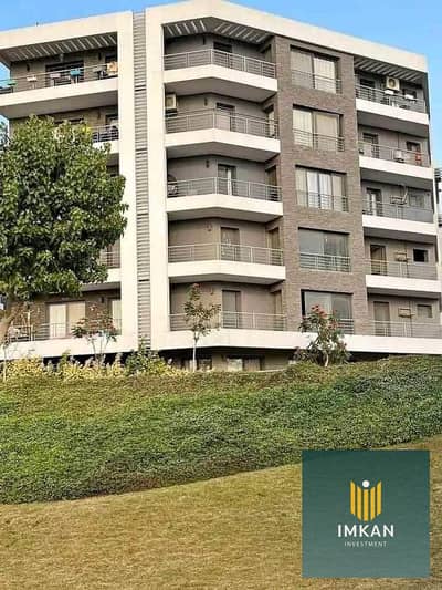 Apartment for sale in a **prime location** in **First Settlement**, **New Cairo**, with a **50% cash discount**, in **Taj City Compound – Cairo (TAJ C