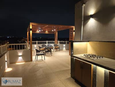 Furnished rooftop studio apartment for rent in Jade Compound, First Settlement, near 90th Street and the American University in Cairo (AUC).