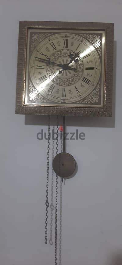 سا_عة حاىط بتشغل بالجاذبية الارضية