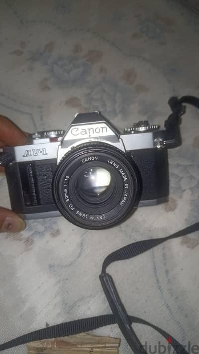 كاميرا فيلم كانون Canon AV-1 مع عدسة 50mm 1:1.8 ياباني