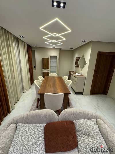 Furnished, air-conditioned hotel-style apartment next to City Stars, available for daily and monthly rent for families. Excellent location in Nasr Cit