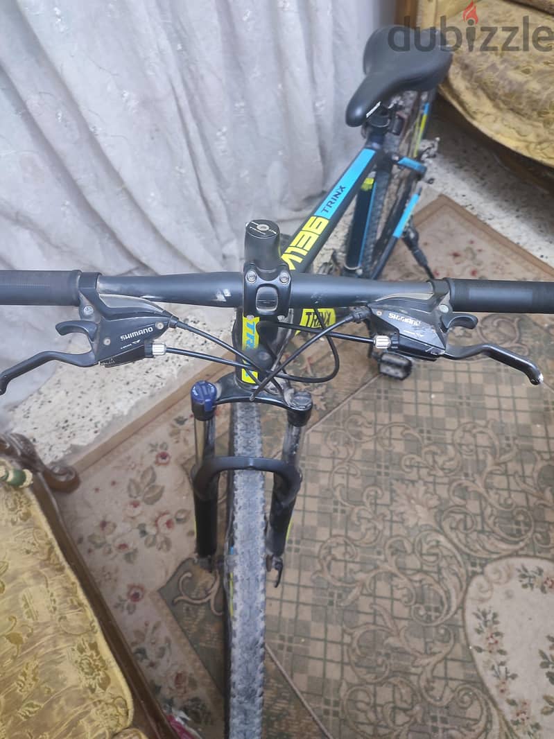 trinx m136 3